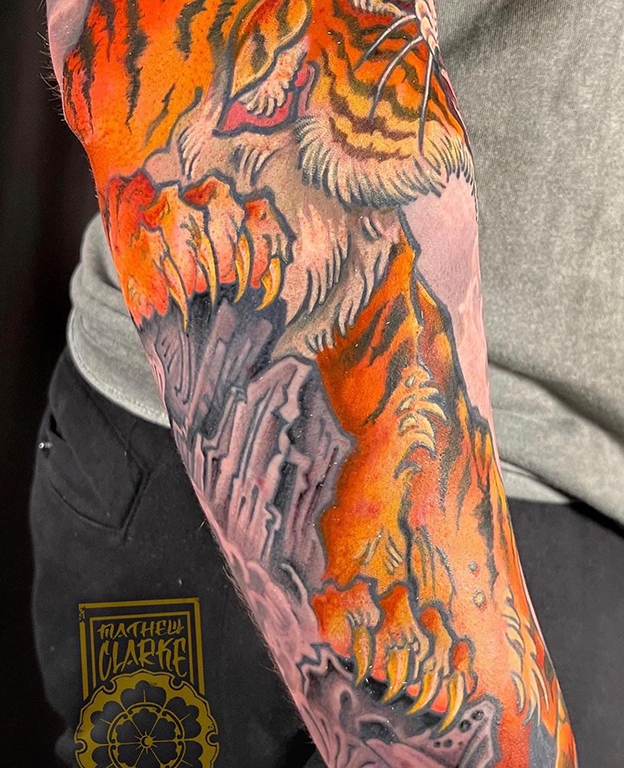 Japanese tiger dragon sleeve tattoo tiger claw close up