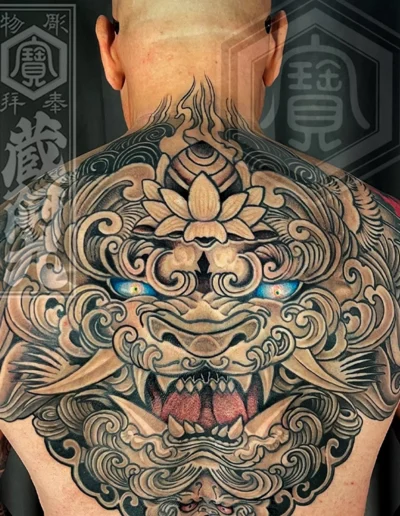 Japanese Fūjin Guardian Lion & Lotus Back Tattoo by Mathew Clarke