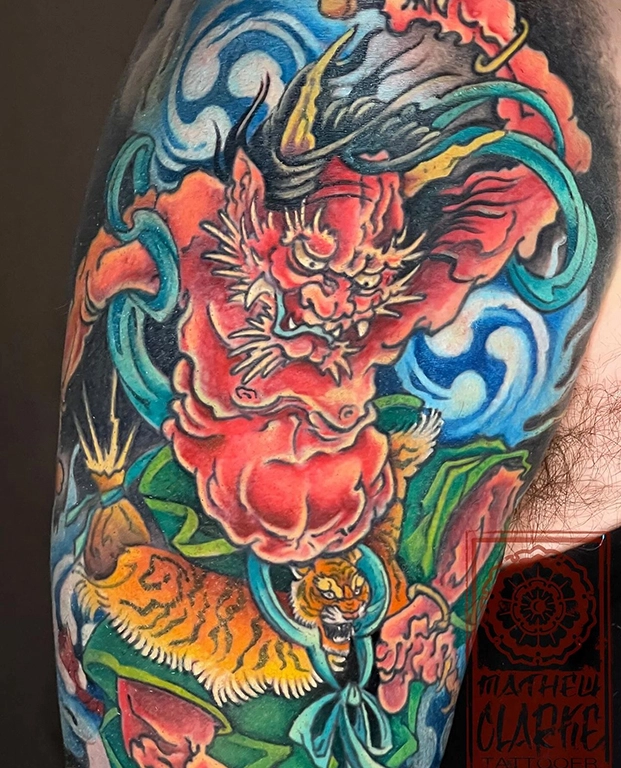 Japanese Mythical Dragon & Foo Dog Sleeve Tattoo close up Oni