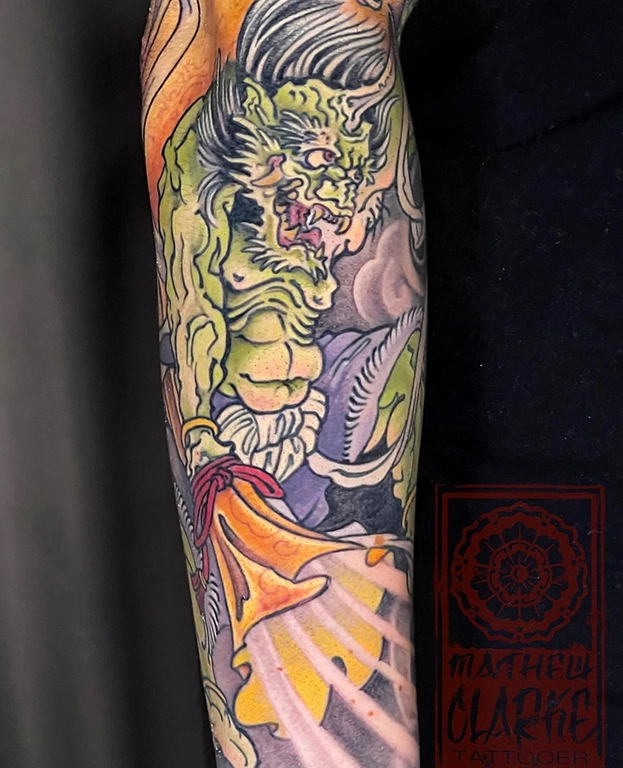Japanese Mythical Dragon & Foo Dog Sleeve Tattoo close up