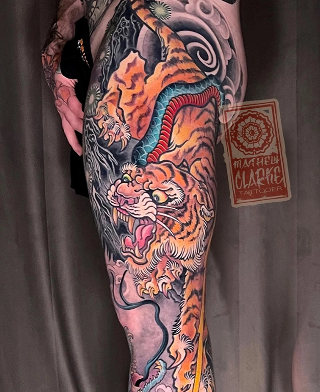 Tiger-Snake leg sleeve tattoo by Mathew Clarke