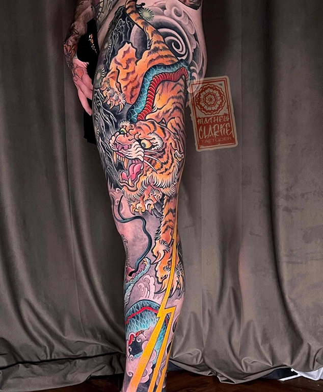 Tiger-Snake leg sleeve tattoo by Mathew Clarke