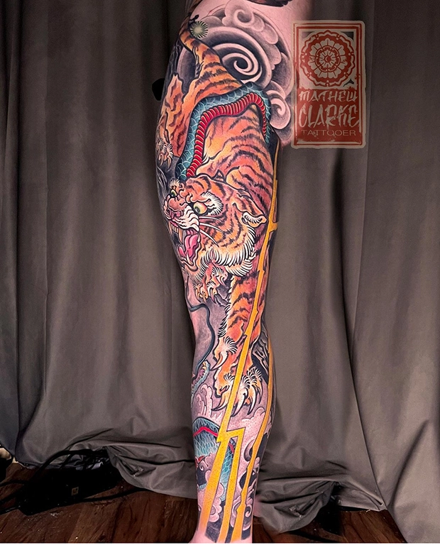 Tiger-Snake leg sleeve tattoo by Mathew Clarke