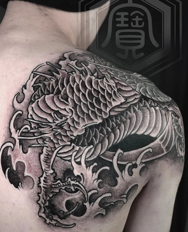 black&white dragon tattoo back